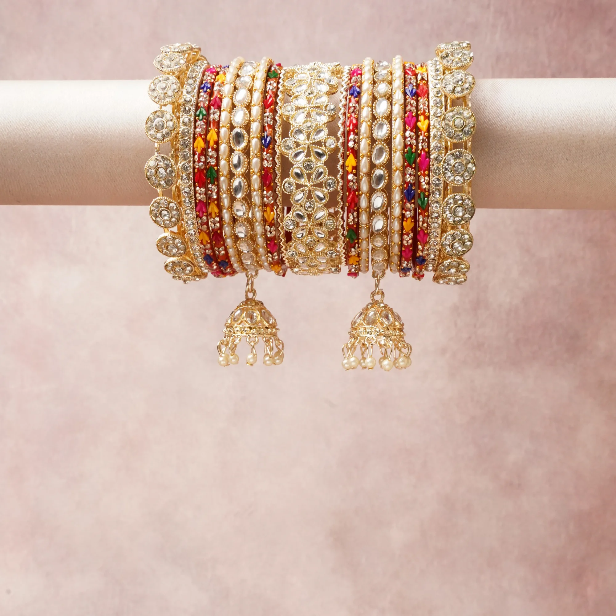 The Femminari Crown- Jewellery beyond luxury. A crown Multi colour set, complemented by Clear, Off-White, Ruby Red, Emerald Green, Sapphire Blue, Marigold Yellow, Fuchsia Pink, Vermilion Orange, featuring Gold, Kundan, Clear Gemstone Simulants, Pearls, Glass Beads, Lac. A treat for the eyes, hands and heart- absolutely unforgettable.